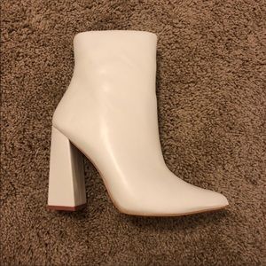 White heeled booties